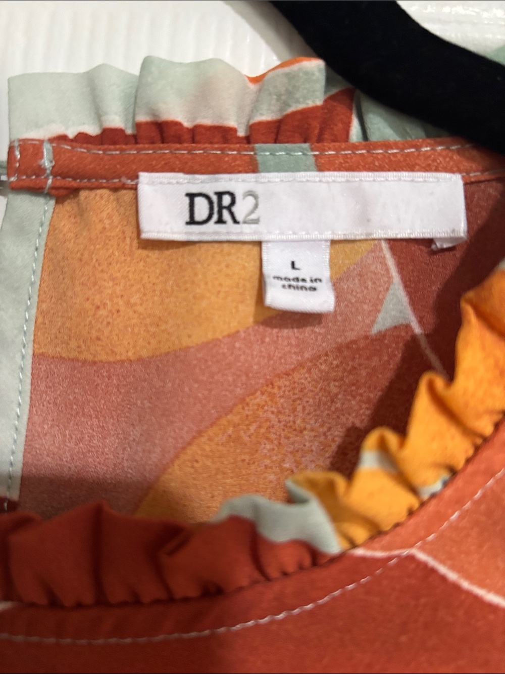 Summer Close Out:
DR2 top with Rust & Gold Floral Print - Picture 2 of 3